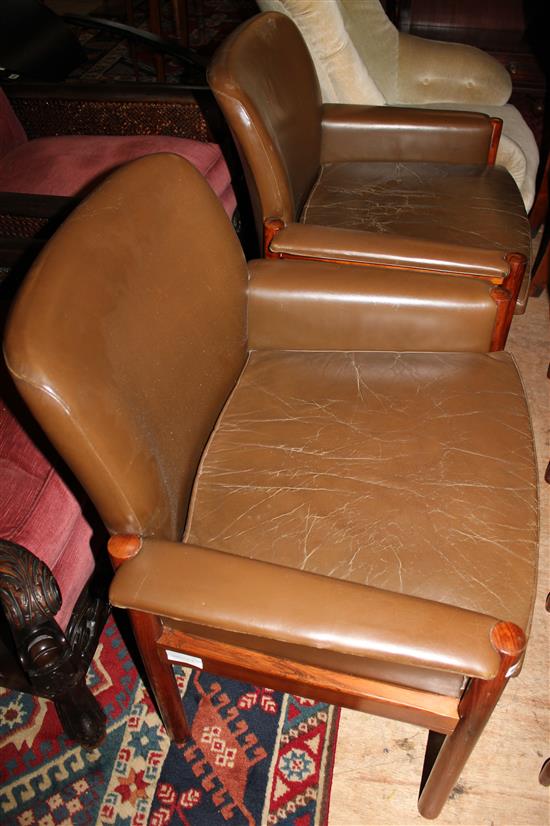 Pair of teak & leather elbow chairs